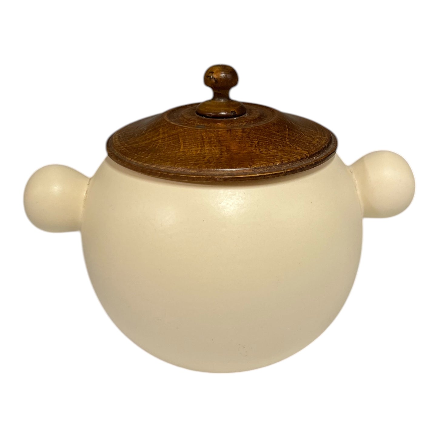 Ceramic jar with wooden lid on a white background