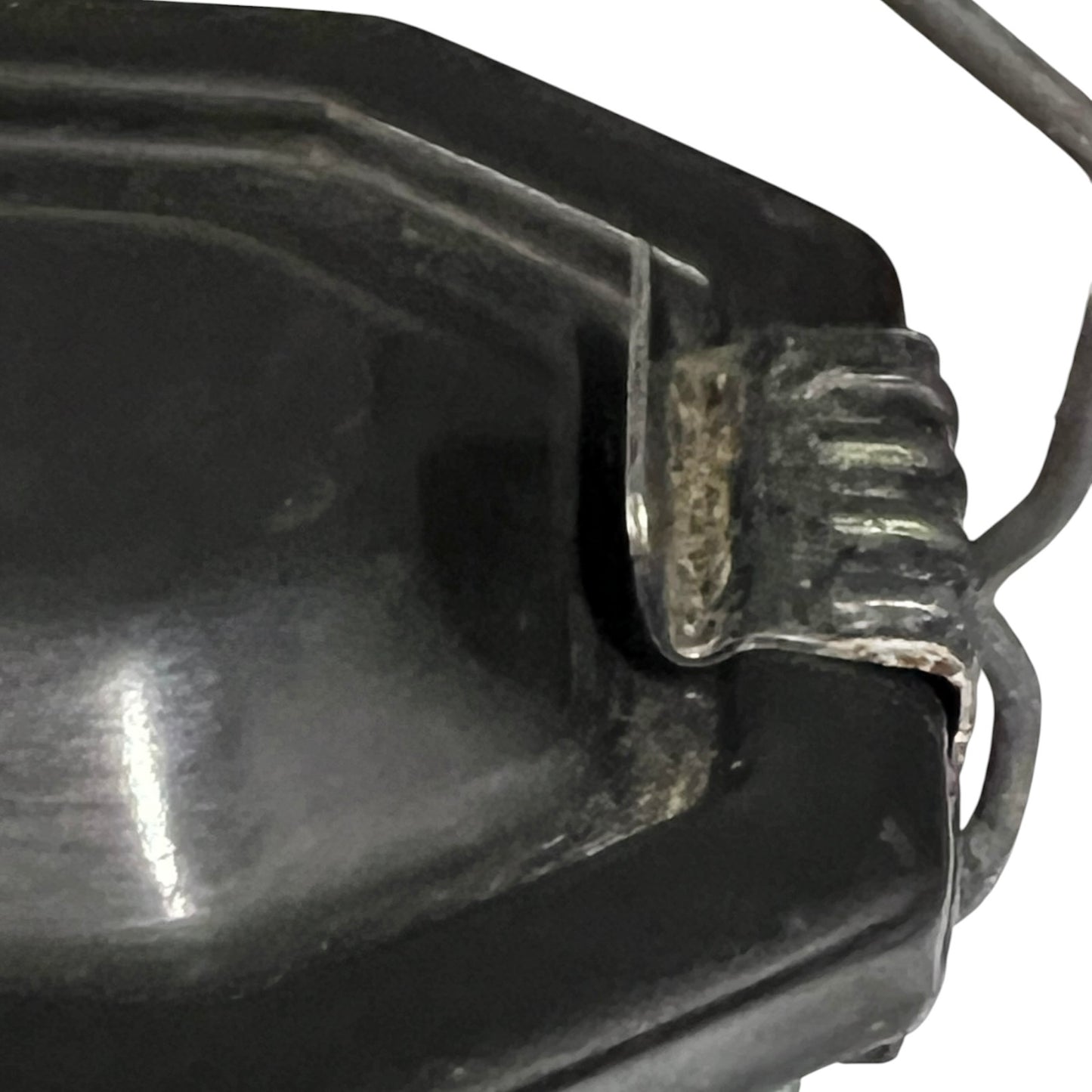Close up of a French enamel lunch box on a white background
