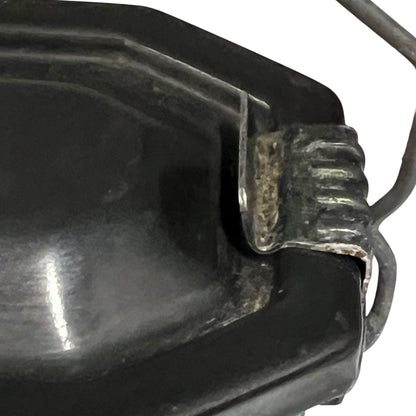 Close up of a French enamel lunch box on a white background