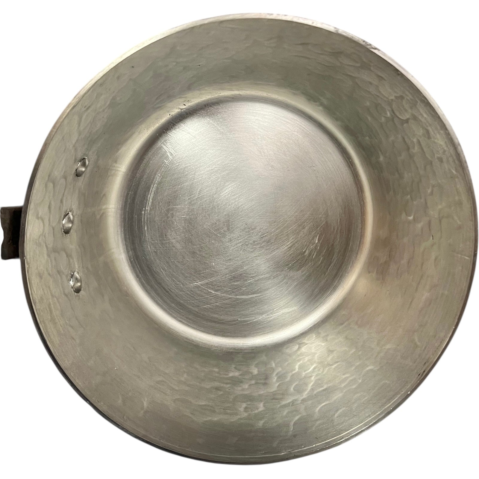 inside tin lining of copper saucepan 