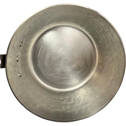 inside tin lining of copper saucepan 