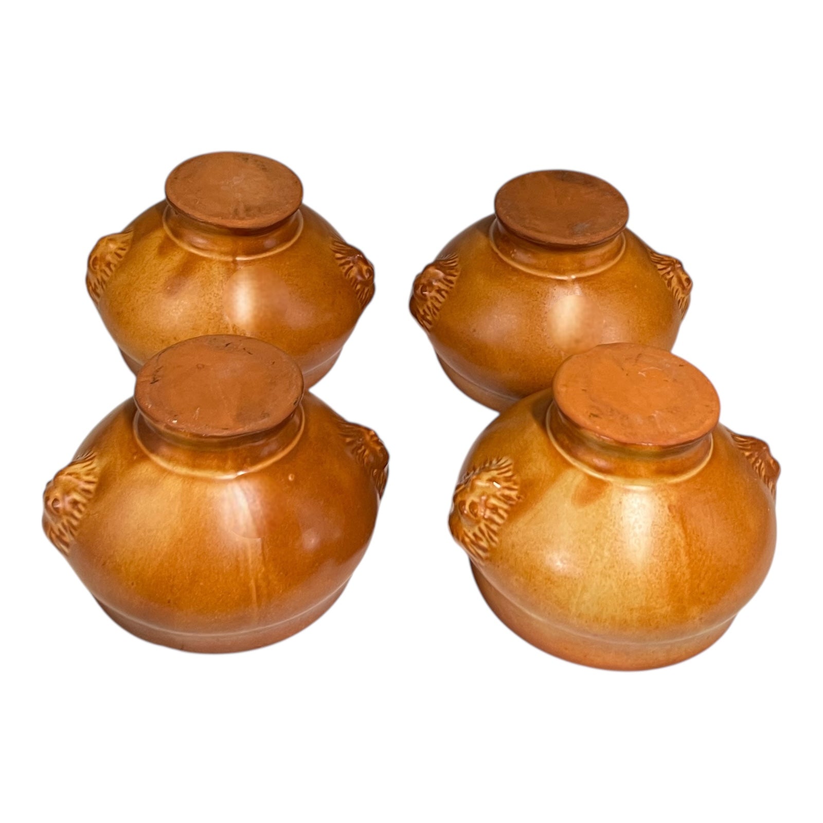 Brown ceramic bowls on a white background