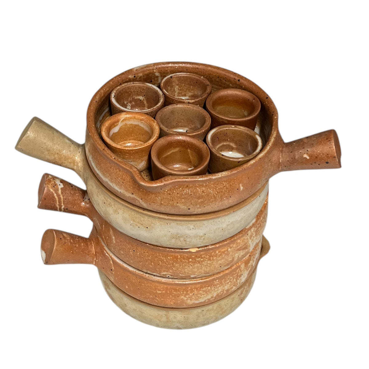 A handmade terracotta clay tea set featuring a small pot with six matching small cups inside, stacked on a base with three separate spout handles, photographed on a solid white background.