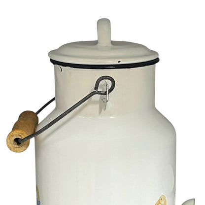 White enamel milk churn and mug with duck design on a white background