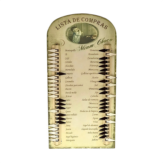 A vintage-style Spanish 'Lista de Compras' shopping list board featuring a parchment-colored background, black and white piano keys, and a list of items under the name 'Miaam Choco'.