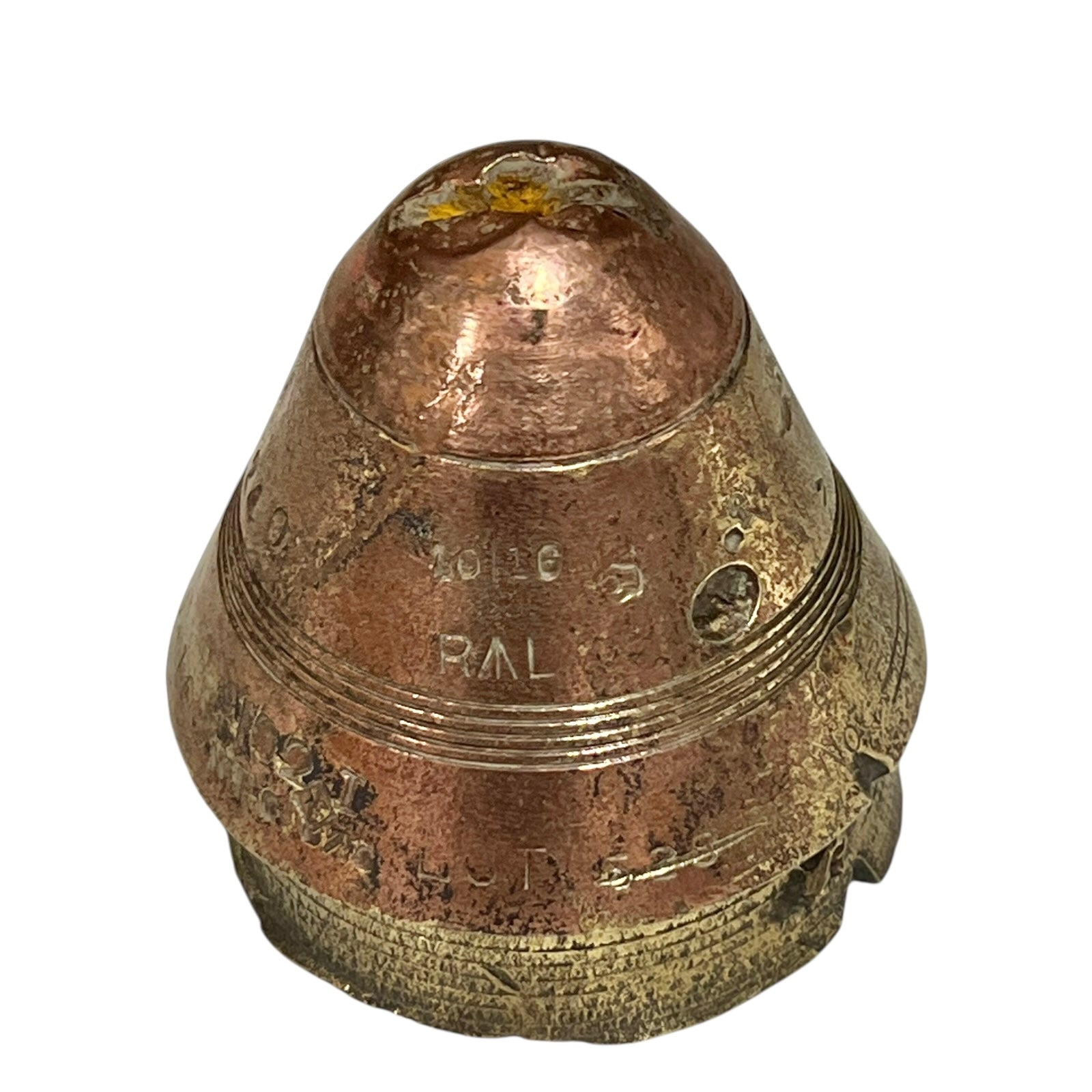 WW1 relic brass fuse number 102, ideal as a paperweight n a white background