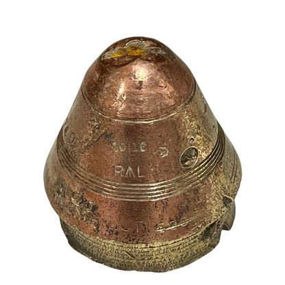 WW1 relic brass fuse number 102, ideal as a paperweight n a white background