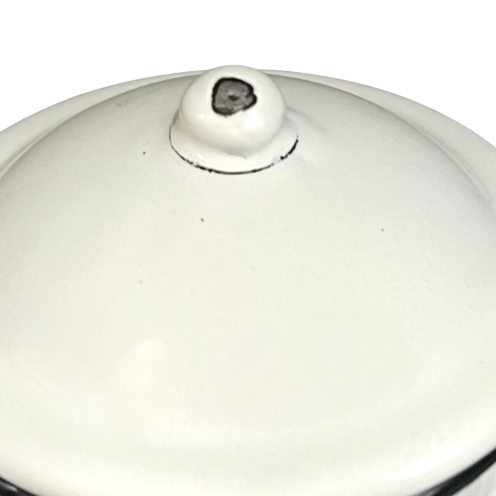 Close up of a French enamel coffee pot on a white background