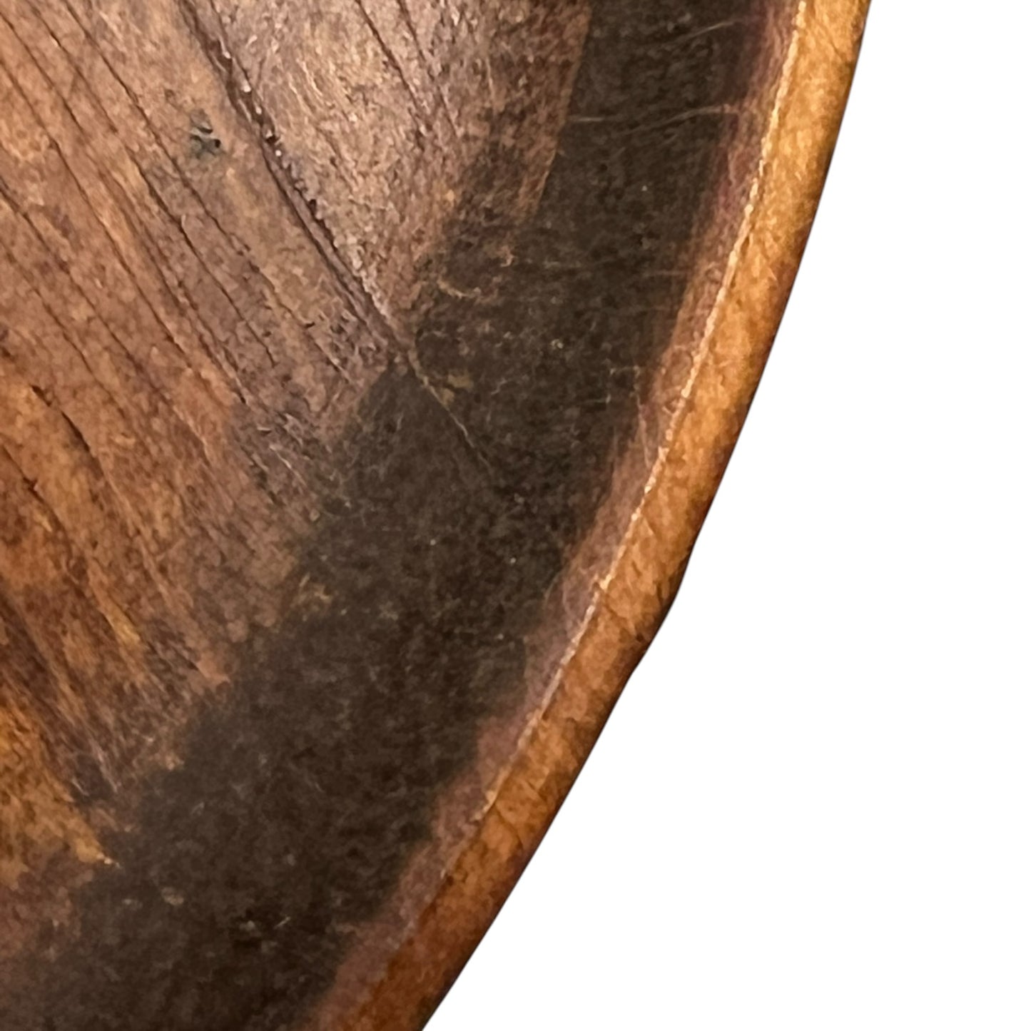 close up of a wooden decorative round plaque on a white background 