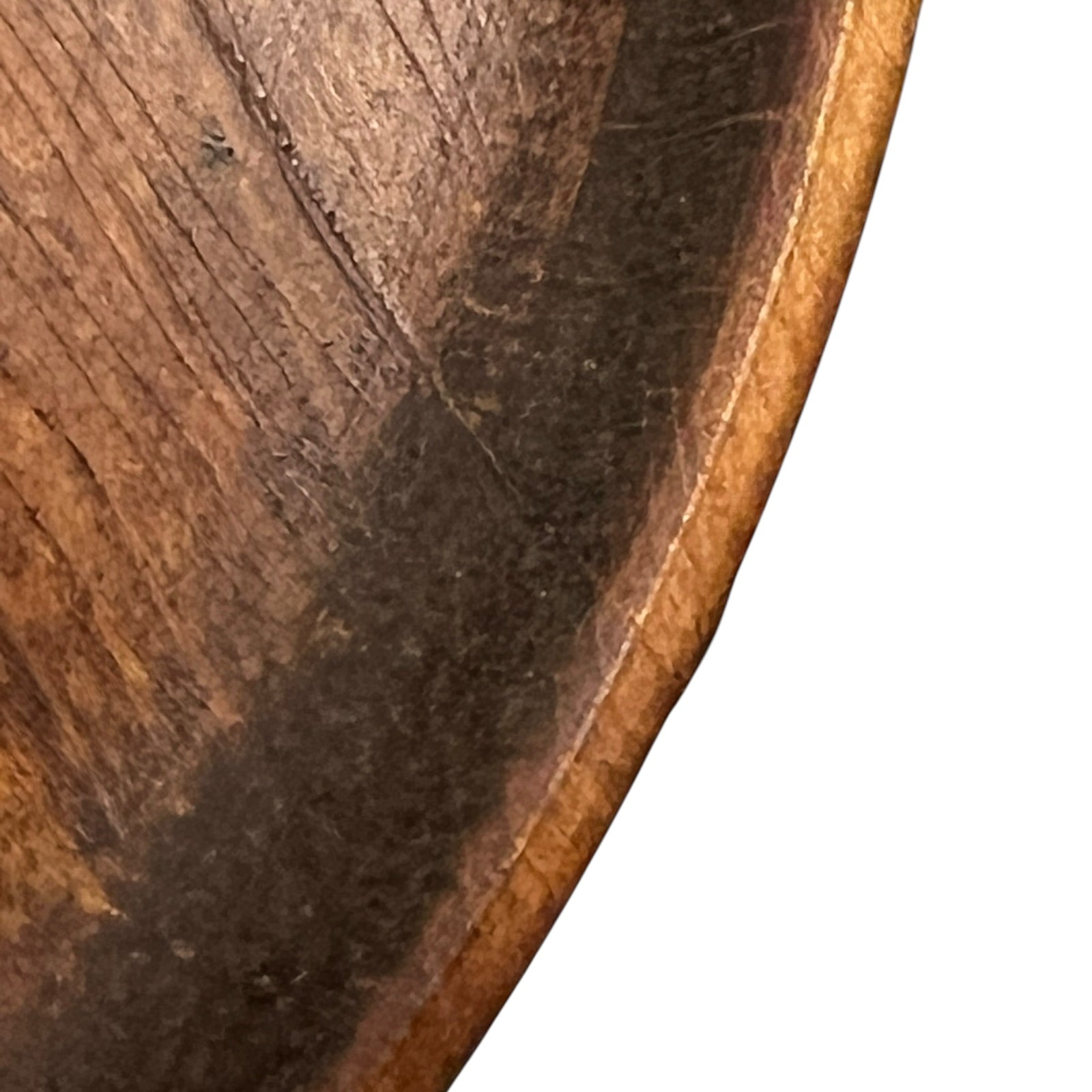 close up of a wooden decorative round plaque on a white background 