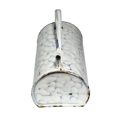 Base view of a vintage French enamel irrigator