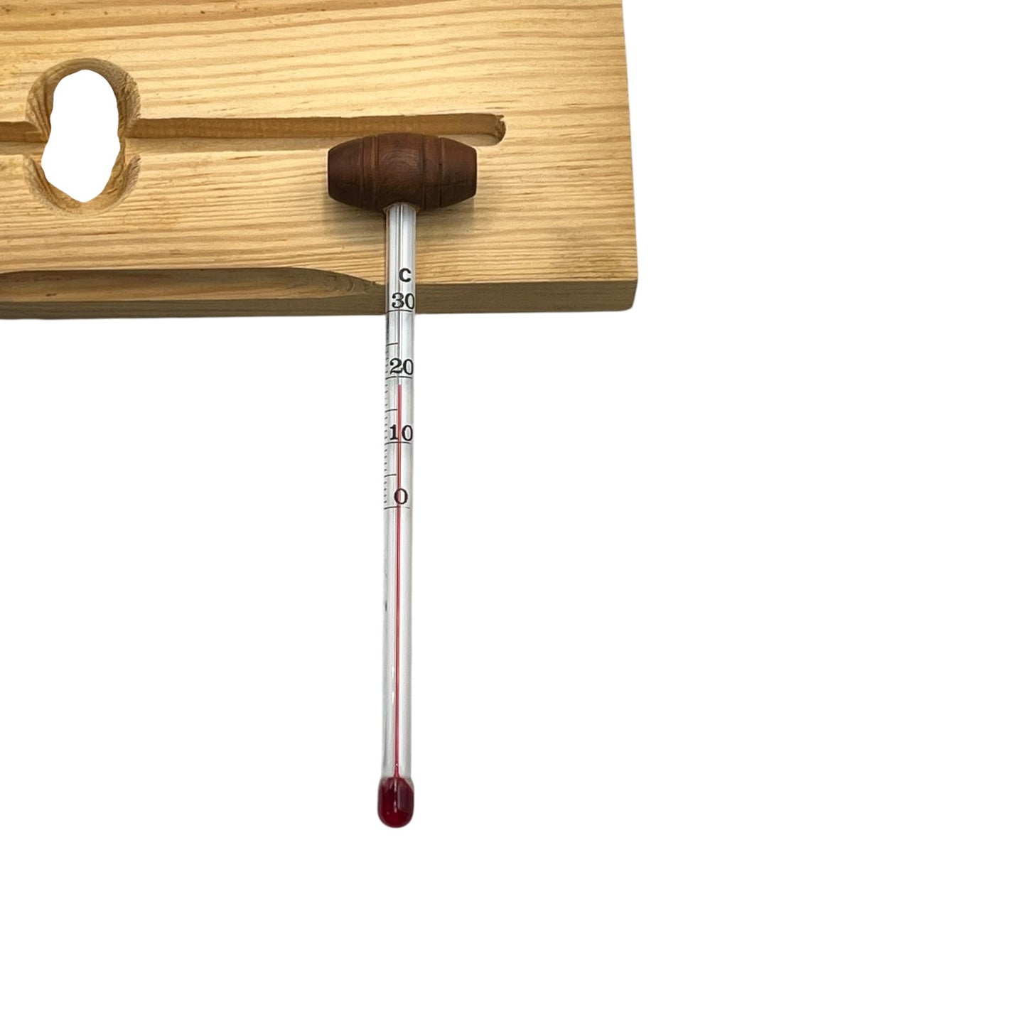 Bourbon proof thermometer with wooden holder on a white background