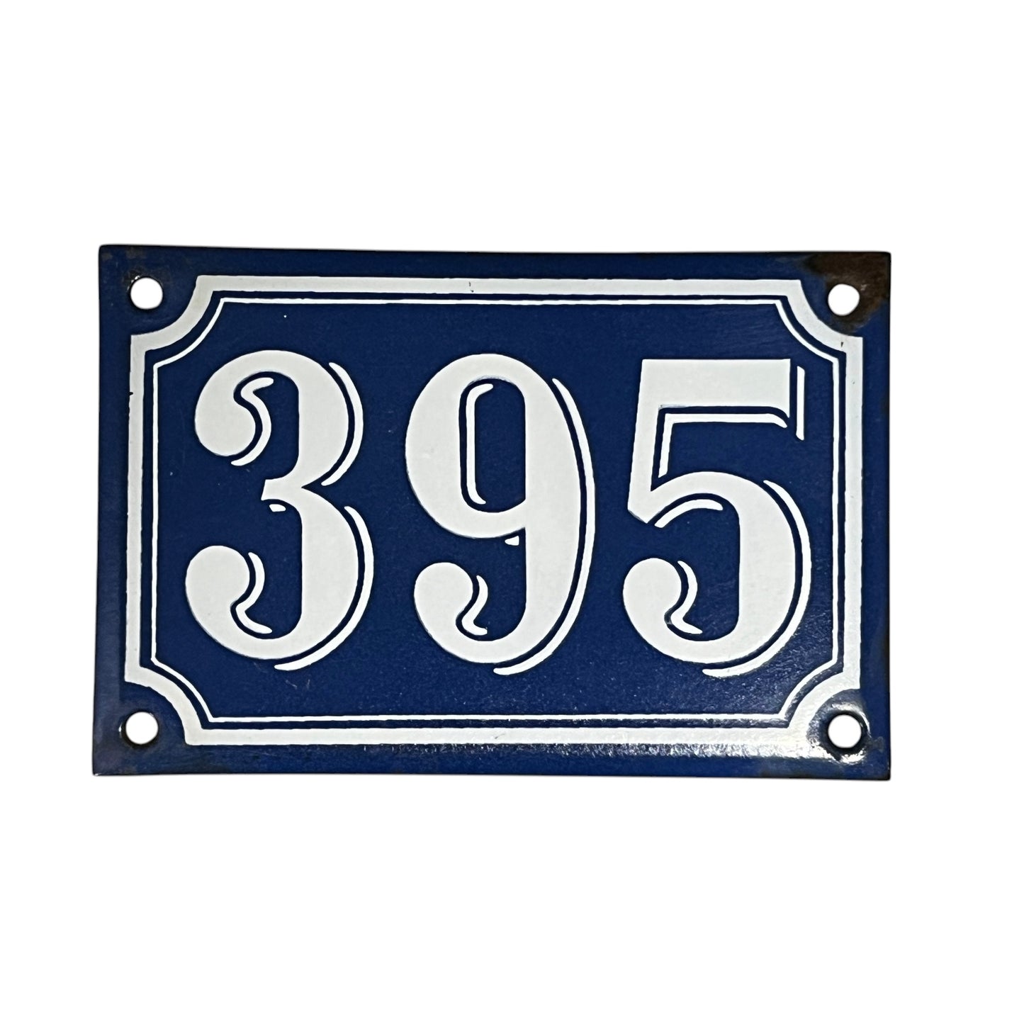 Navy blue rectangular plate with white text '395' on a white background