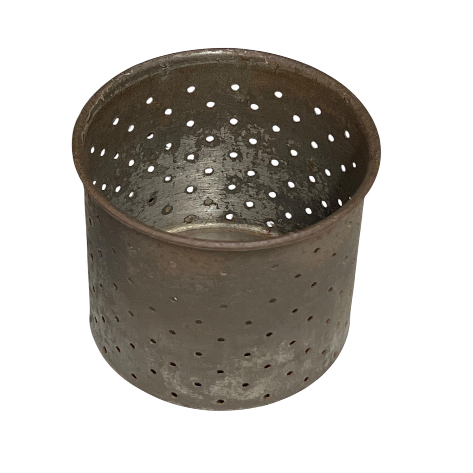 Close-up of a vintage fruit press with holed container on a white background
