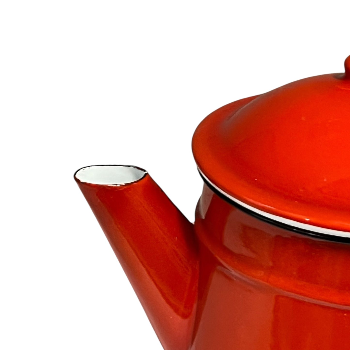 Close-up of a red teapot on a white background