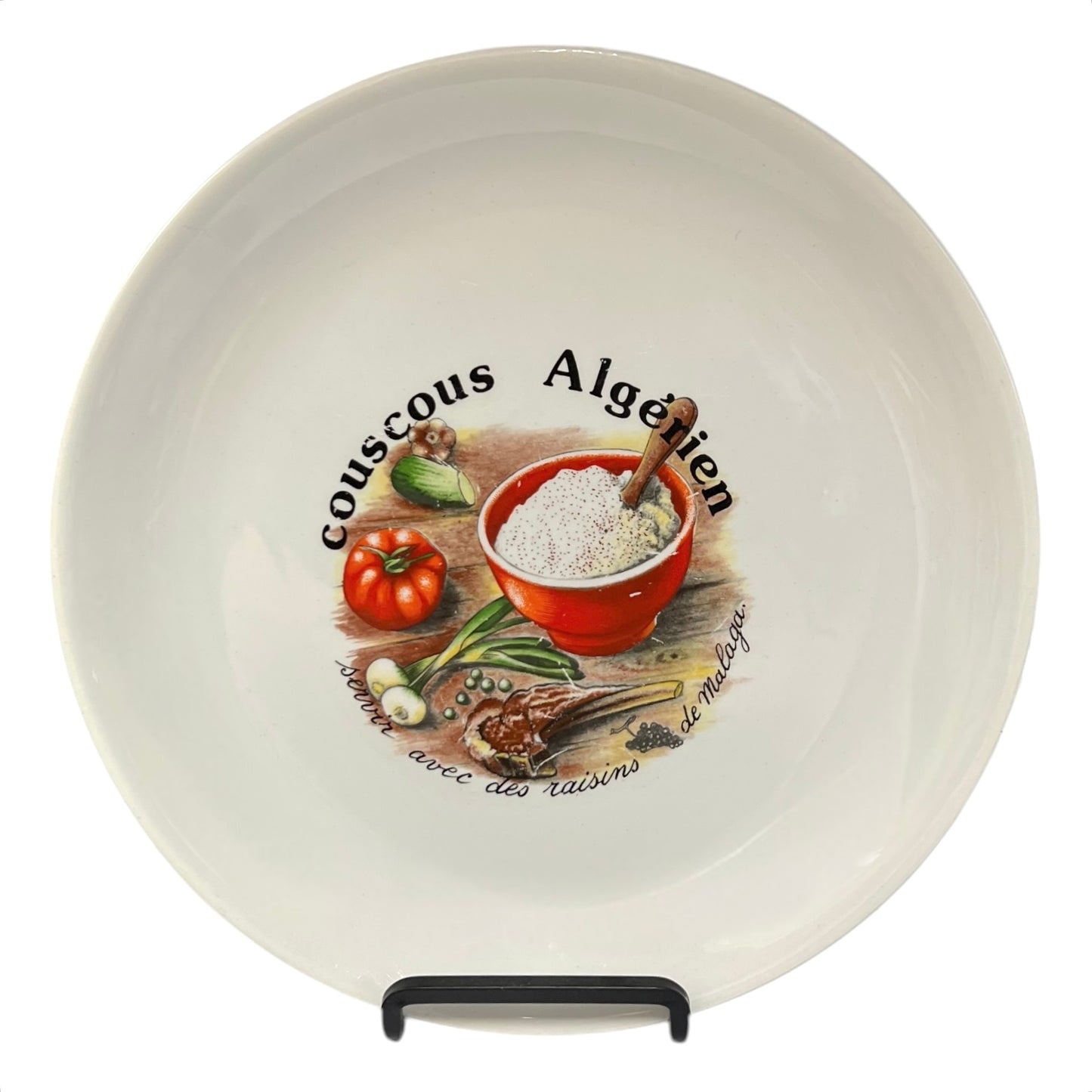 Ceramic plate with couscous Algerien design on a white background