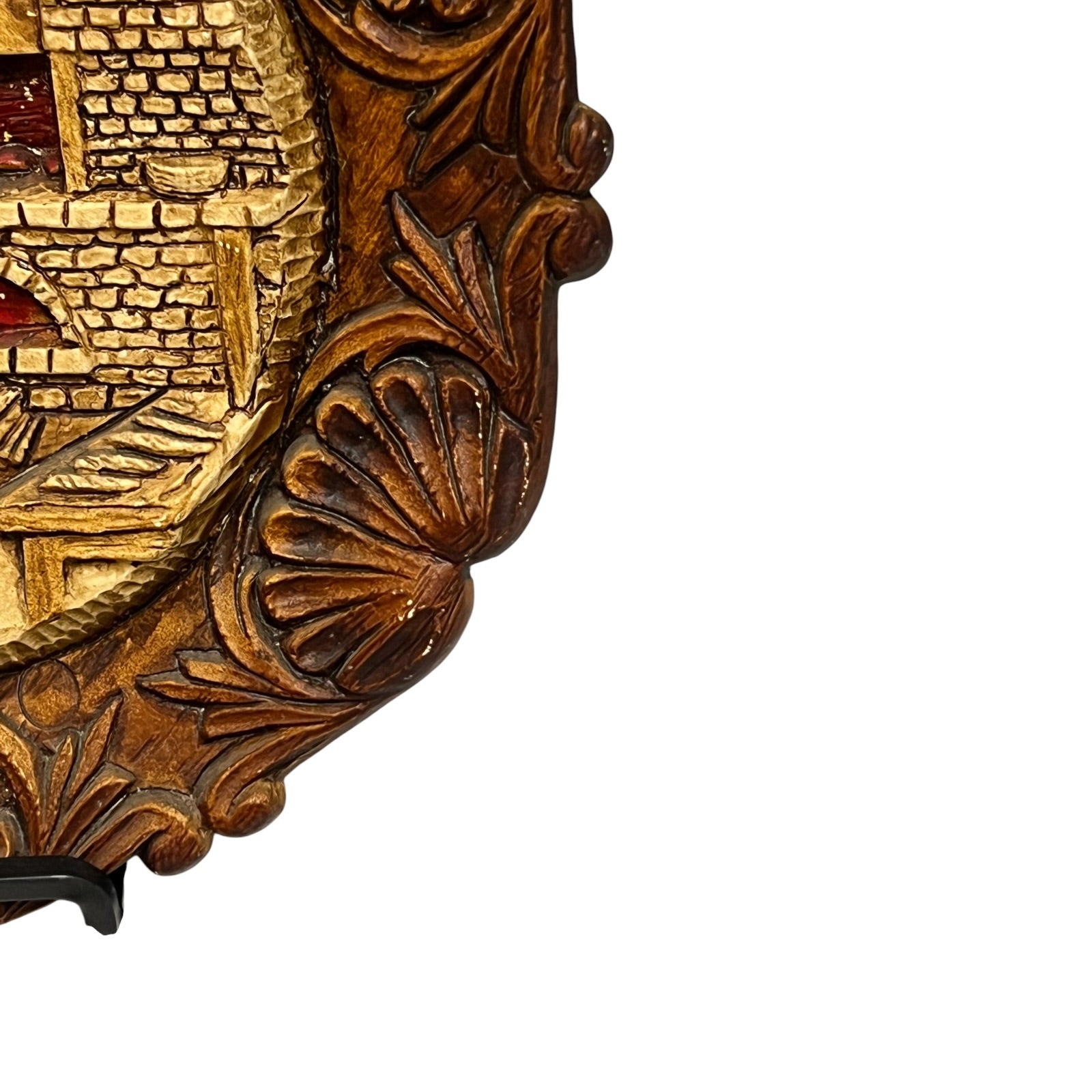 Close up of a raised 3d wood resin wall plaque of a French baker on a white background