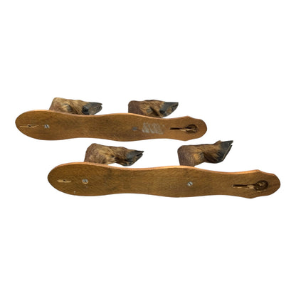 back view of boar hooves on a white background