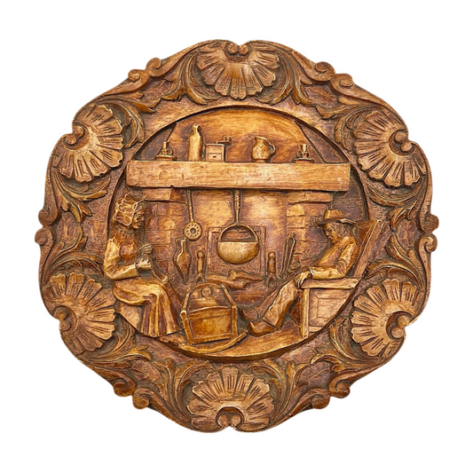 Wooden wall plaque with intricate carvings of people and tools on a white background
