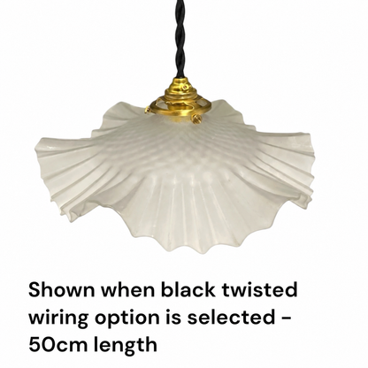 A white ribbed glass pendant light shade hanging from a black twisted wire and gold metal fixture, with text below stating it is shown when the black twisted wiring option is selected - 50cm length.