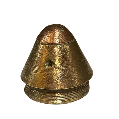 A vintage brass bell-shaped metal component with a textured, hammered finish and a small circular hole on the side, isolated on a white background.