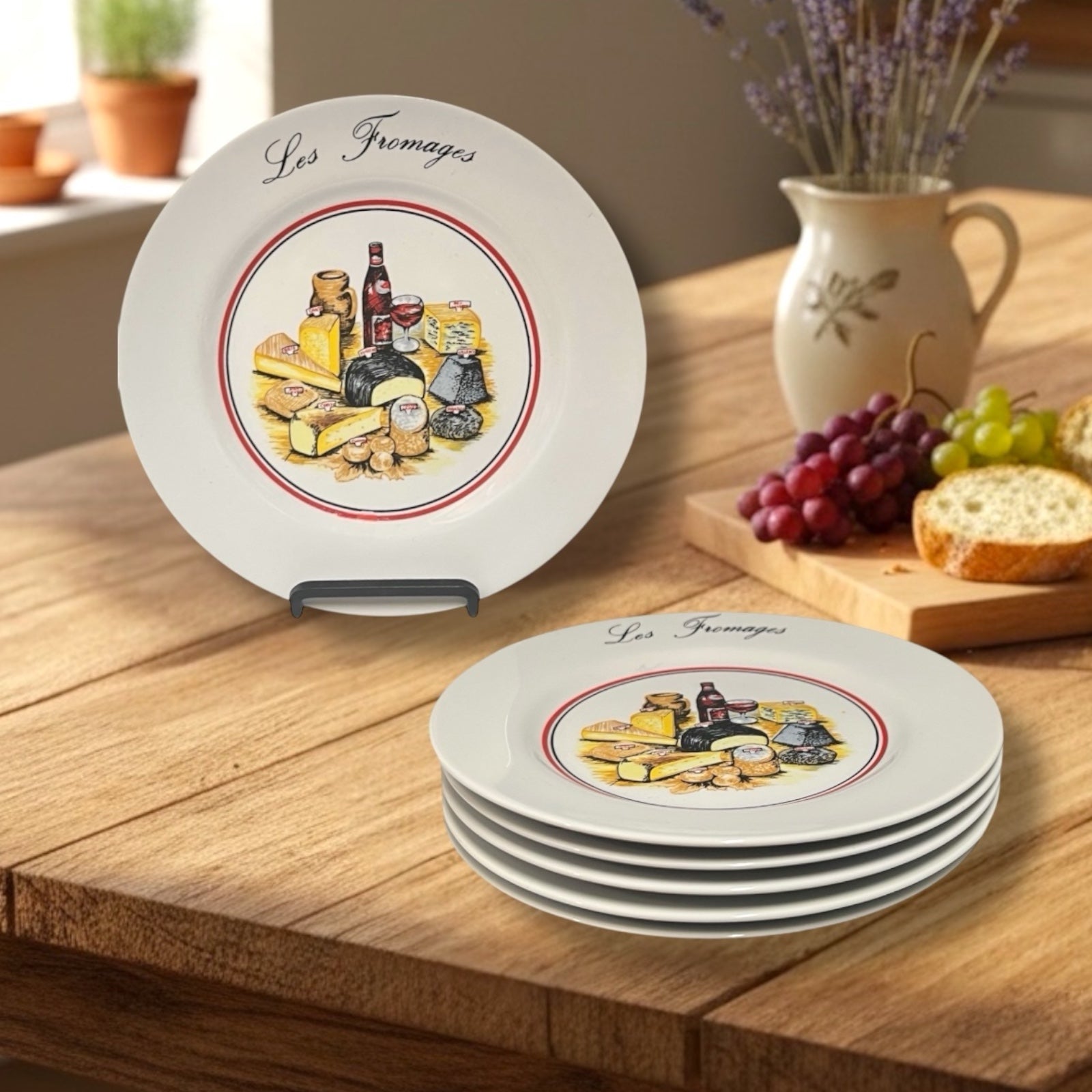 Set of decorative plates with cheese illustration on a wooden table