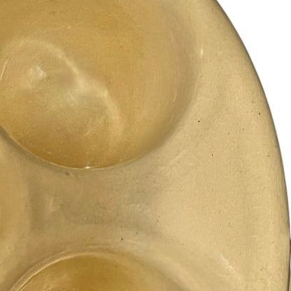 Close up of snail plates with handles on a white background