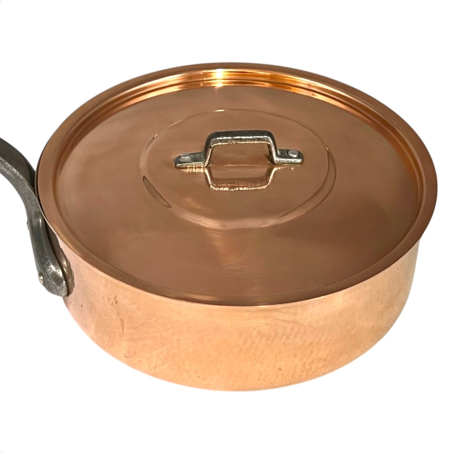 Copper pot with lid on a white background
