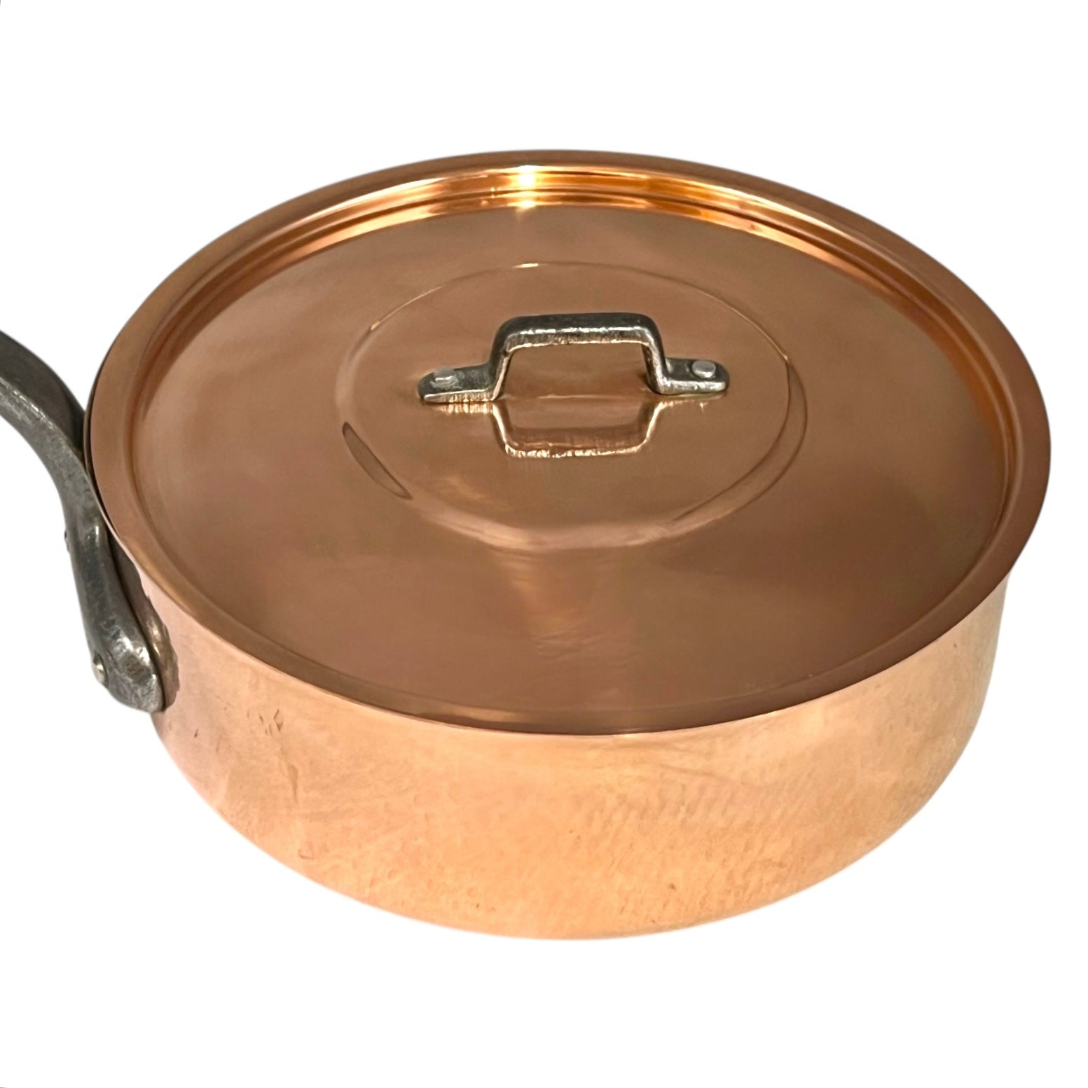 Copper pot with lid on a white background