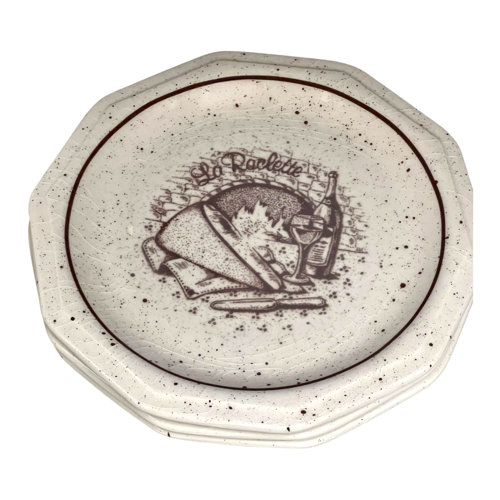  La Raclette plates with a decorative design on a white background