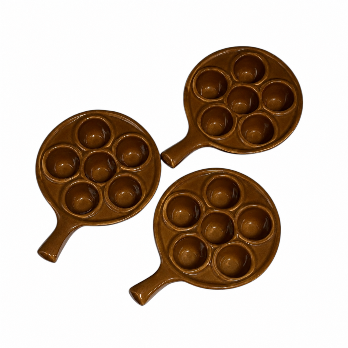 3 snail plates, brown on a white background 
