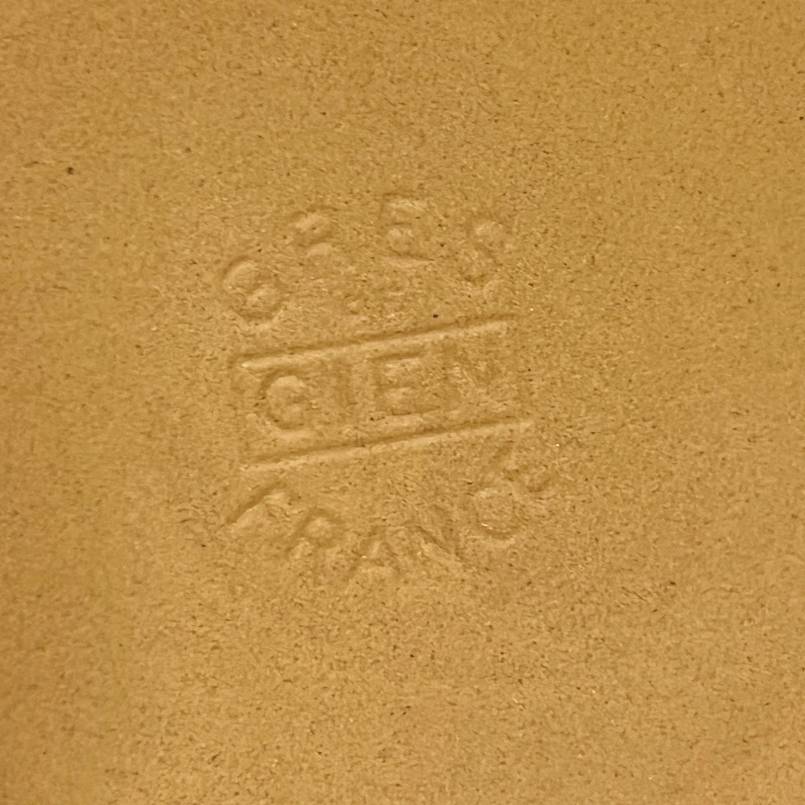 Plate with Gien and Made in France on a white background