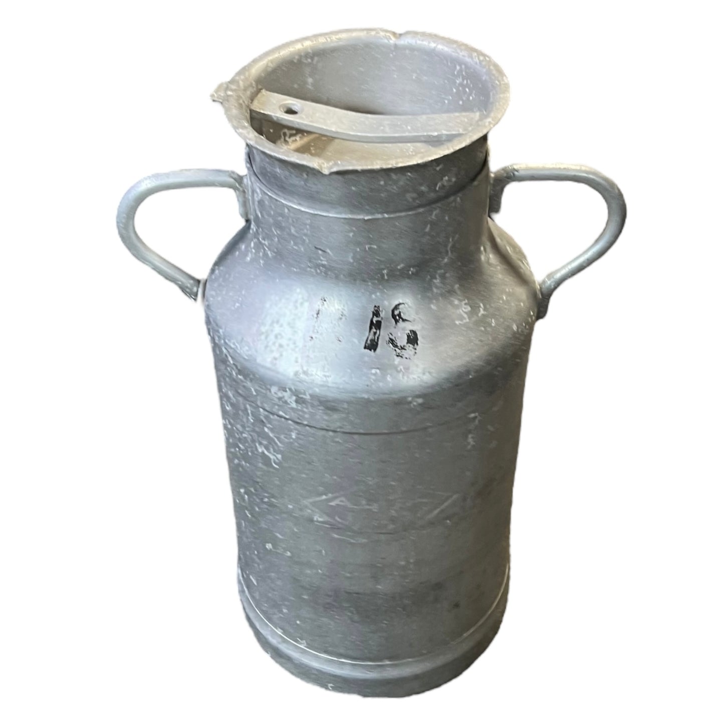 Metal milk churn on a white background