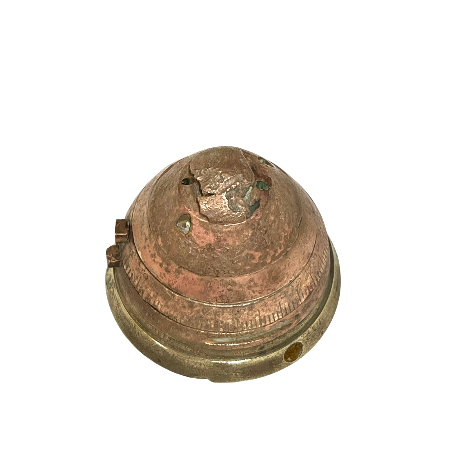 WW1 brass fuse paperweight on a white background