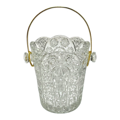 Decorative glass ice bucket with a handle, ideal for a home bar or cocktail bar on a white background