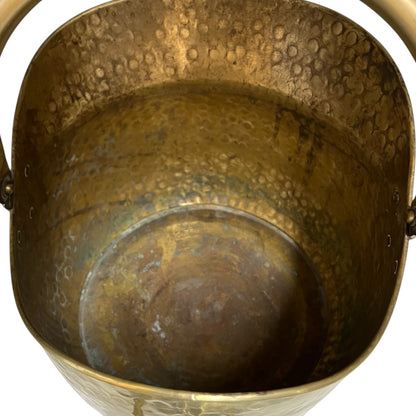 close up of a coal bucket with handle on a white background