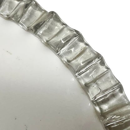 close up of a frilled clear edge glass lampshade