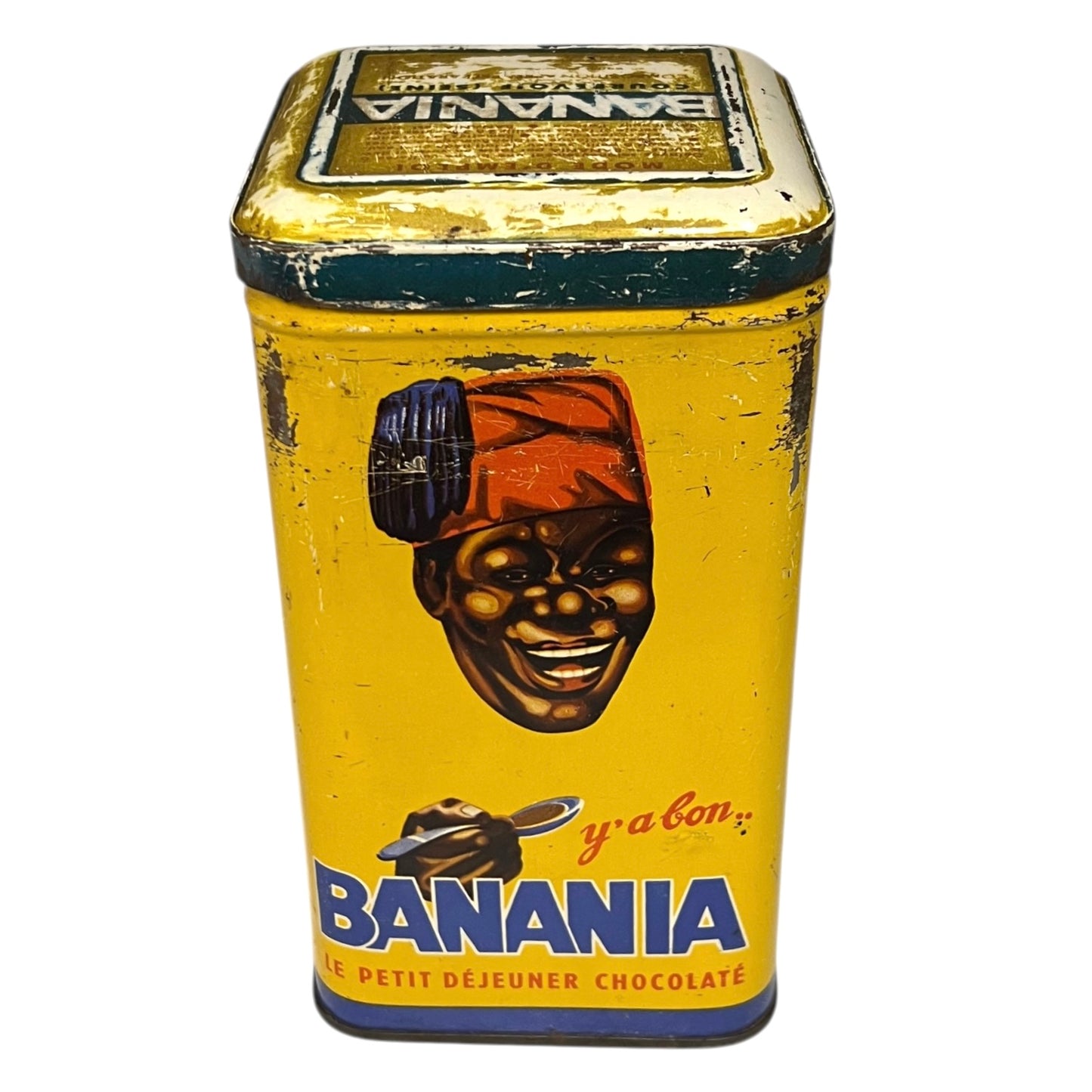 Vintage tin can with a colorful design featuring a face and 'Banania' branding on a white background.