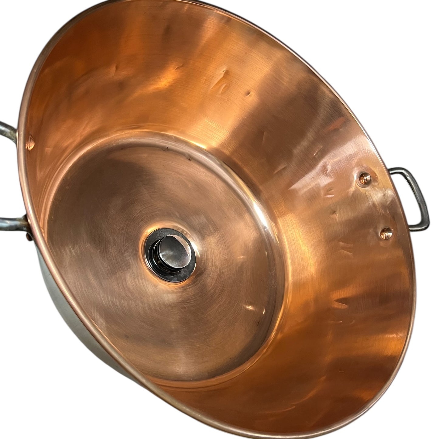 Close-up of a copper sink on a white background