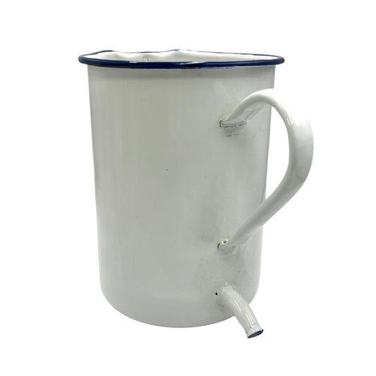 White enamel jug with blue rim and spout on a white background