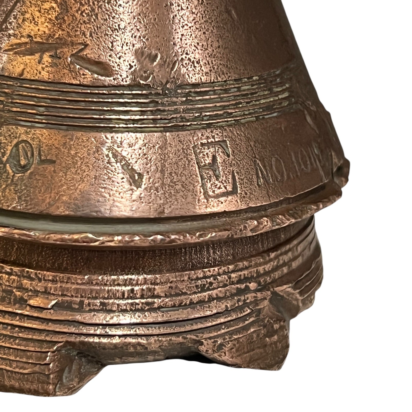WW1 brass fuse paperweight on a white background 