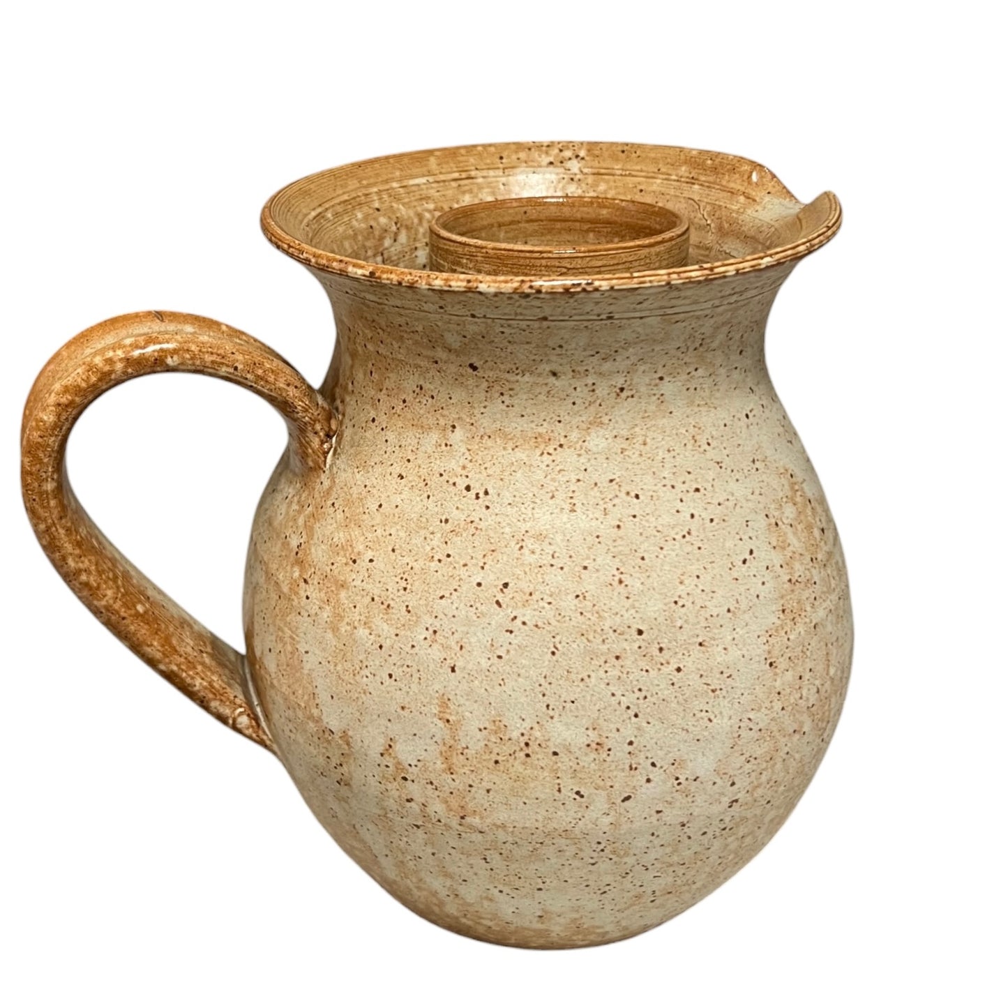 Ceramic pitcher with a handle on a white background