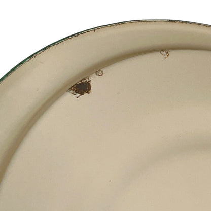Close up of French vintage cream and green enamel bucket with a lid and handle on a white background