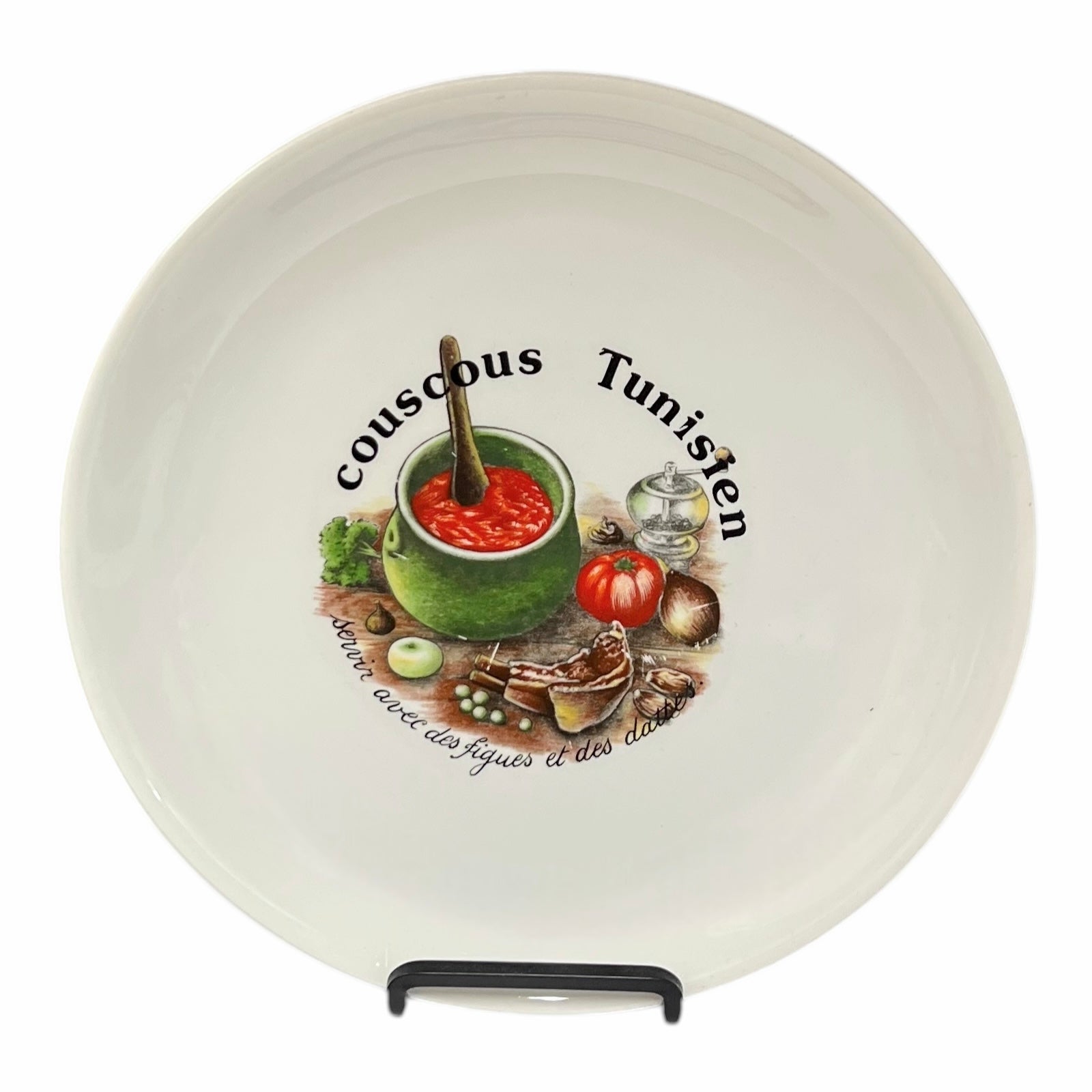 Ceramic plate with Tunisian couscous design and text on a white background
