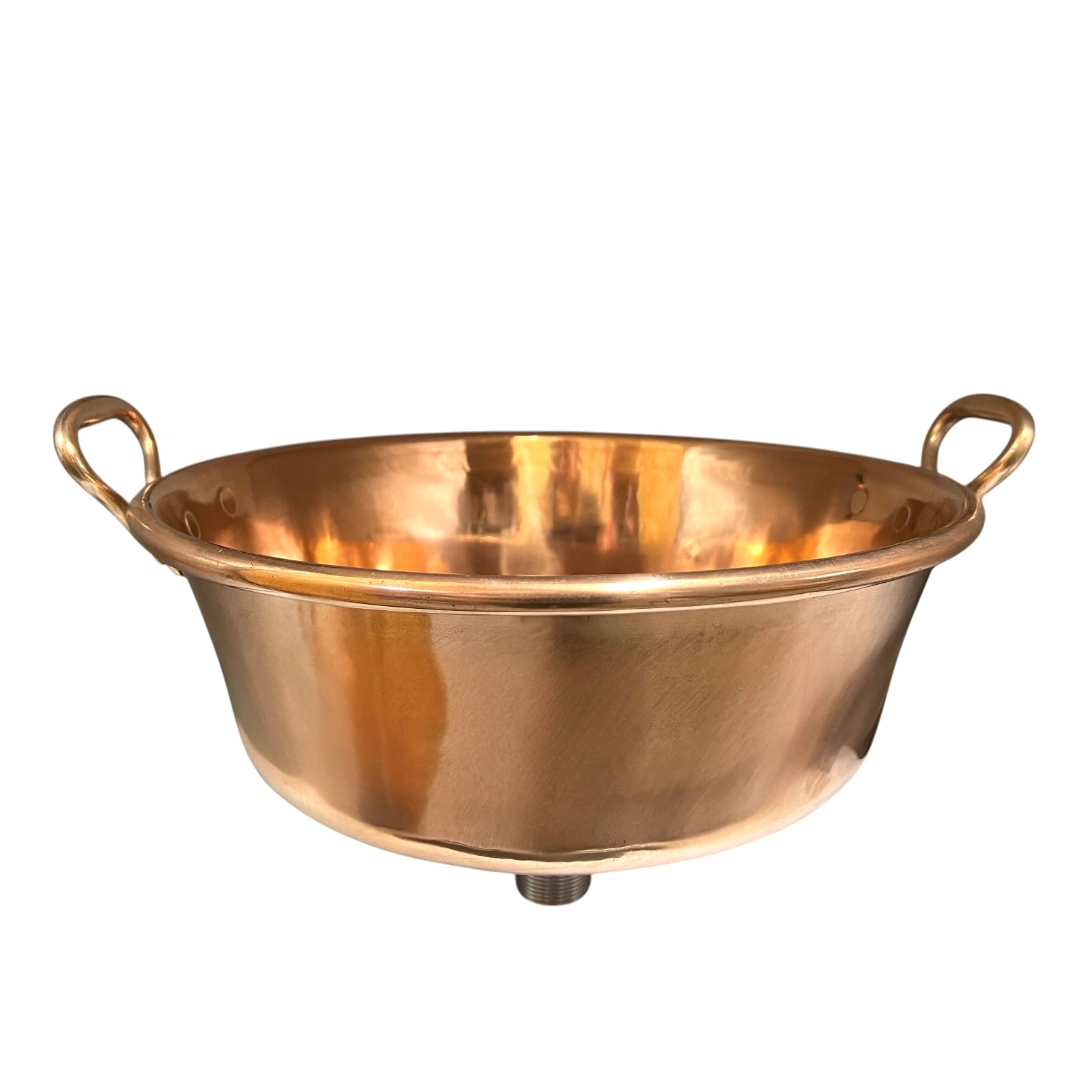 A round copper-colored metal pot with two loop handles on the sides, shown against a plain white background.