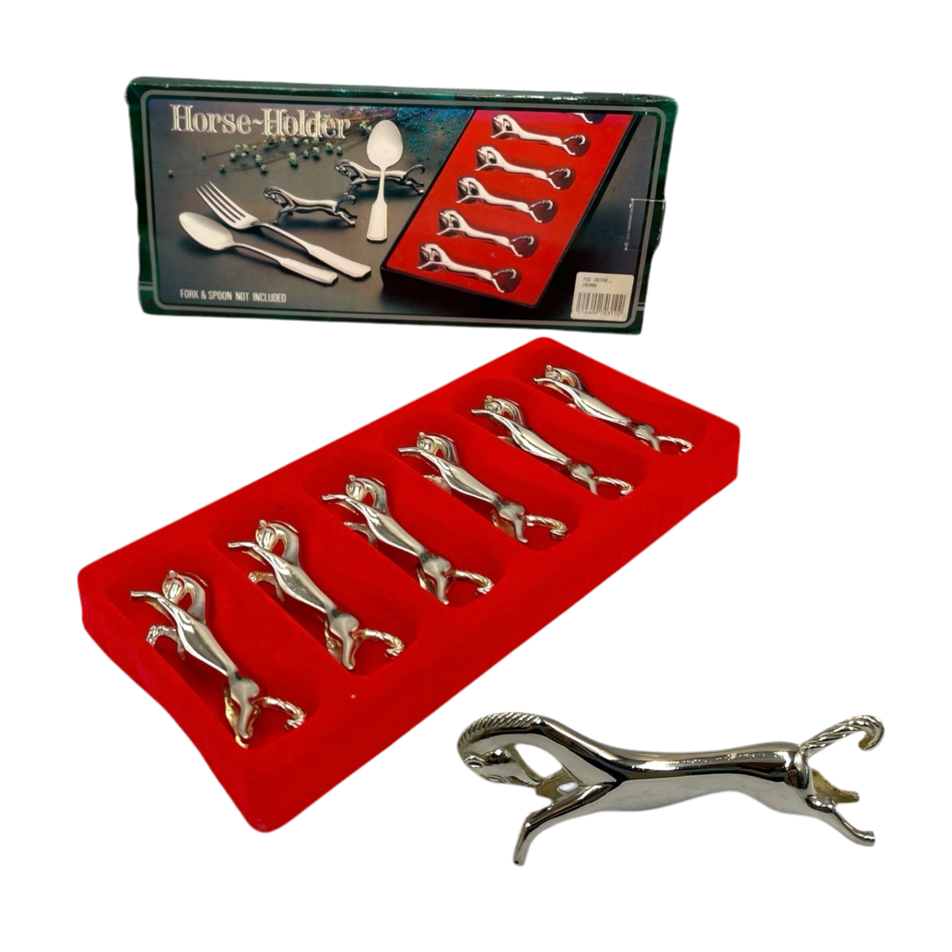 A set of silver plated horse shaped knife rests beside their original box with a red lining on a white background 