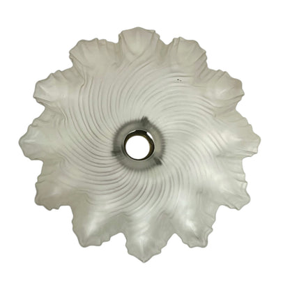 Close up of a vintage-style light fixture with frosted glass shade on a white background