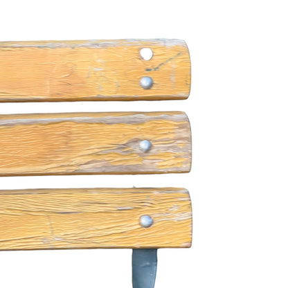 Close up of a wooden French folding chair on a white background 