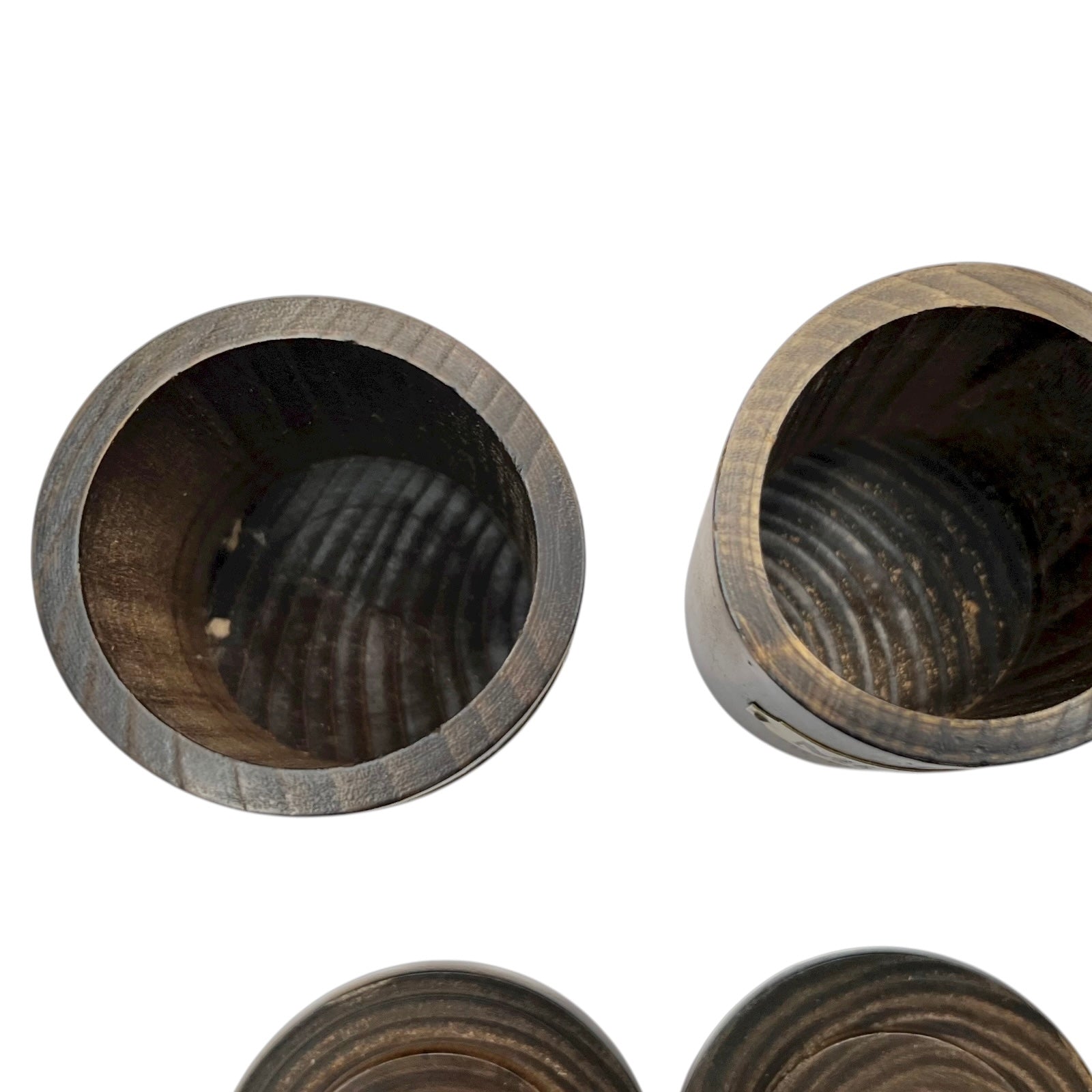 inside view of wooden spice jars with lids on a white background