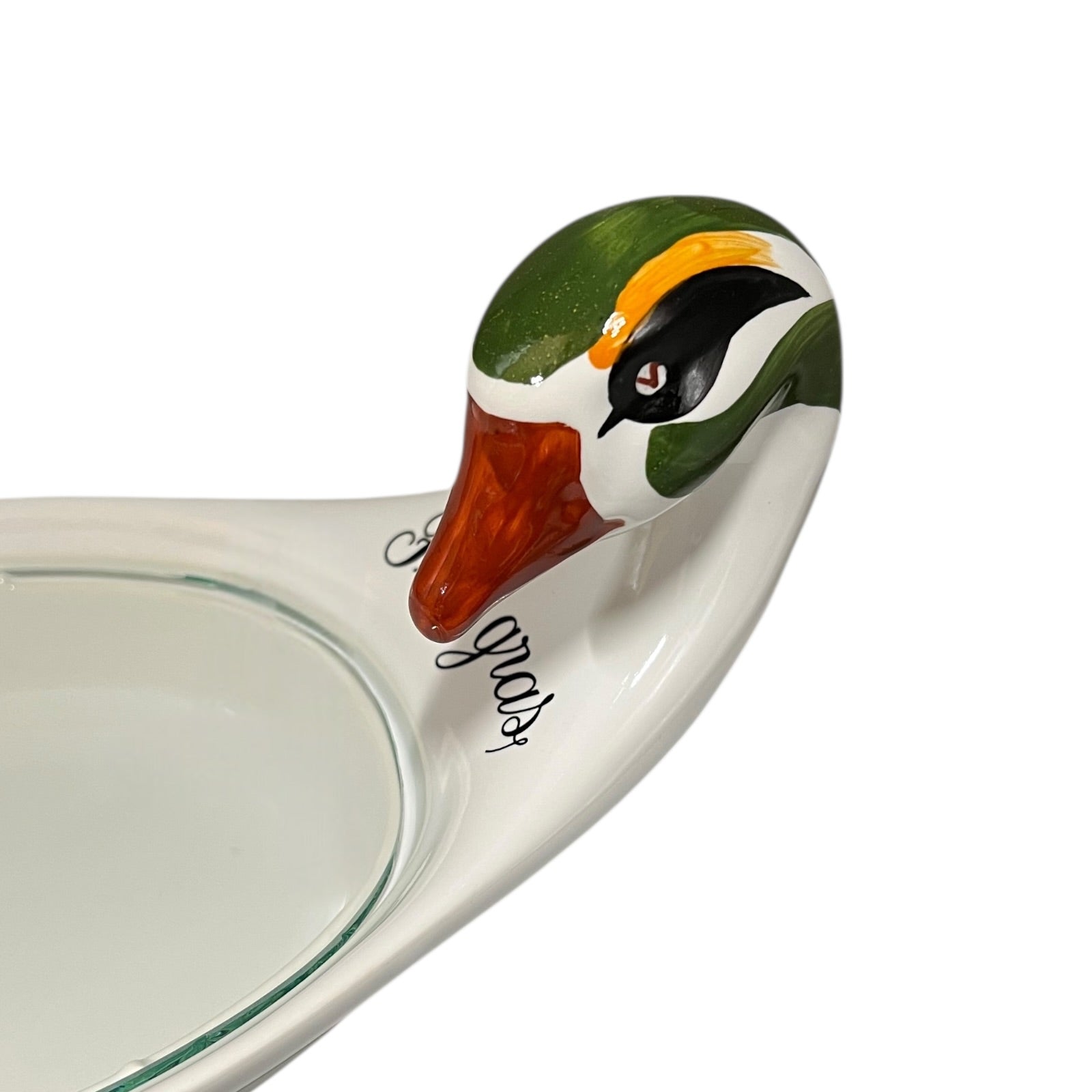 Duck-shaped dish with a white background